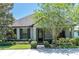 Charming single-story home with manicured landscaping and inviting entrance at 12462 Rangeland Blvd, Odessa, FL 33556