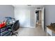 Bedroom showcasing tile floors and closet space with access to hallway and natural light at 1615 Loghill Pl, Brandon, FL 33510