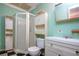 Small bathroom featuring shower stall with glass door, tile floor, and vanity at 1616 Lightfoot Rd, Wimauma, FL 33598