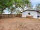Spacious backyard with a wood fence, perfect for outdoor activities and entertaining at 1700 25Th N St, St Petersburg, FL 33713