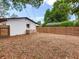 Wood fence surrounds the backyard, providing privacy and security at 1700 25Th N St, St Petersburg, FL 33713