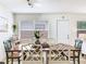 Cozy dining area featuring a wooden dining table set with elegant decorations at 1700 25Th N St, St Petersburg, FL 33713