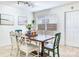 Charming dining room showcasing a wooden table and chairs, with an abundance of natural light at 1700 25Th N St, St Petersburg, FL 33713