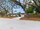 Lovely single-story home showcasing a well-maintained yard and a wood fence at 1700 25Th N St, St Petersburg, FL 33713