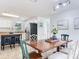 Kitchen featuring an island with seating, tile floors and stainless steel appliances at 1700 25Th N St, St Petersburg, FL 33713