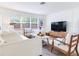 Cozy living room featuring stylish furniture, modern decor, and a large window at 1700 25Th N St, St Petersburg, FL 33713