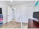 Office with desk, light wood floors, and large closet at 1700 25Th N St, St Petersburg, FL 33713