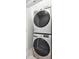 Efficient laundry closet features a stacked washer and dryer for space-saving convenience at 1913 W Pine St, Tampa, FL 33607
