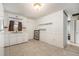 The kitchen features tile flooring, natural light and white cabinets at 20653 Old Trilby Rd, Dade City, FL 33523