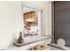 Kitchen pass-through window with breakfast bar seating at 2072 Maguire Ave, Spring Hill, FL 34608