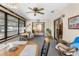 Enclosed sunroom showing connection to indoor space at 2072 Maguire Ave, Spring Hill, FL 34608