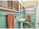 Vintage bathroom featuring colorful tile work, a pedestal sink, and a classic design at 220 22Nd Se Ave, St Petersburg, FL 33705