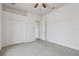 White bedroom featuring a ceiling fan and carpeted floors at 2605 59Th S St, Gulfport, FL 33707