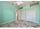 Stylish bedroom with ceiling fan and spacious closet at 2605 59Th S St, Gulfport, FL 33707