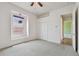 White bedroom featuring a window, ceiling fan and carpeted floors at 2605 59Th S St, Gulfport, FL 33707