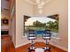 Breakfast nook with two chairs, backyard view and pool at 2605 59Th S St, Gulfport, FL 33707