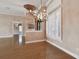 Dining space showcases hardwood floors, decorative ceilings, and open access to other living areas at 2605 59Th S St, Gulfport, FL 33707