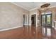 Grand foyer features decorative iron doors and elegant lighting fixtures, showcasing the home's sophisticated design at 2605 59Th S St, Gulfport, FL 33707