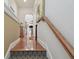 Hallway with hardwood floors, wainscoting, and visible decor at 2605 59Th S St, Gulfport, FL 33707