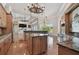 Spacious kitchen with island, granite countertops, and stainless steel appliances at 2605 59Th S St, Gulfport, FL 33707
