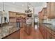 Gourmet kitchen with granite countertops, center island, and stainless steel appliances at 2605 59Th S St, Gulfport, FL 33707