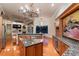 Beautiful open-concept kitchen with stainless steel appliances and custom cabinets with pool view for entertainment at 2605 59Th S St, Gulfport, FL 33707