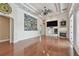 Spacious living room featuring fireplace and television entertainment center at 2605 59Th S St, Gulfport, FL 33707
