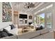 Open living area with fireplace, entertainment center, and backyard view, ideal for relaxing at 2605 59Th S St, Gulfport, FL 33707