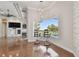 Bright living room with pool view and custom seating at the counter height window at 2605 59Th S St, Gulfport, FL 33707