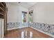 Bright office space with hardwood floors, decorative wall-paper, and natural light at 2605 59Th S St, Gulfport, FL 33707