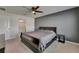 Calm bedroom featuring a sled bed, ceiling fan, and a gray accent wall at 2805 Gumbo Limbo Dr, Wimauma, FL 33598