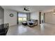 Comfortable living room with large window and tile flooring at 2805 Gumbo Limbo Dr, Wimauma, FL 33598