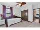 Bedroom featuring ceiling fan, natural light, daybed, neutral carpet and closet at 3100 Barbour Trl, Odessa, FL 33556