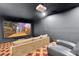Home theater features a large screen, projector and comfortable seating at 3100 Barbour Trl, Odessa, FL 33556