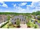 Stunning aerial view of a well-maintained home nestled in a lush, green neighborhood at 3243 Watermark Dr, Wesley Chapel, FL 33544