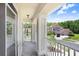 Balcony view showcasing the house exterior and landscaped front yard at 3243 Watermark Dr, Wesley Chapel, FL 33544