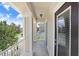 View of the charming balcony with white railings, and a scenic neighborhood view at 3243 Watermark Dr, Wesley Chapel, FL 33544