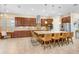 Gourmet kitchen with granite countertops, island seating, and modern appliances, perfect for cooking and entertaining at 3243 Watermark Dr, Wesley Chapel, FL 33544