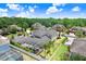 Lovely house features a large screened-in pool area and beautifully landscaped backyard at 3243 Watermark Dr, Wesley Chapel, FL 33544