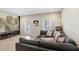 Home theater room featuring comfortable seating, a large projection screen, and custom decor at 3243 Watermark Dr, Wesley Chapel, FL 33544