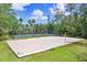 Community sand volleyball court with surrounding landscaping at 3243 Watermark Dr, Wesley Chapel, FL 33544
