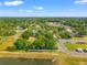 Aerial view of a neighborhood highlighting proximity to water and community amenities at 3611 W Reynolds St # 1/2, Plant City, FL 33563