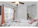 Bedroom featuring natural light, closet, ceiling fan at 36568 Garden Wall Way, Zephyrhills, FL 33541