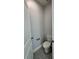 Small half bathroom features wood-look tile floor and neutral paint at 37533 Teri Ct, Dade City, FL 33525