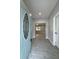 Inviting entryway featuring stylish tile flooring and a decorative front door at 37533 Teri Ct, Dade City, FL 33525