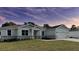 Charming single-story home with a two-car garage, stone accents, and well-maintained landscaping at 37533 Teri Ct, Dade City, FL 33525
