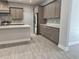 New kitchen with stainless appliances and gray shaker cabinets at 37533 Teri Ct, Dade City, FL 33525