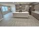 Spacious kitchen featuring an island, stainless steel appliances, and ample cabinet space at 37533 Teri Ct, Dade City, FL 33525