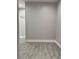 Empty room showcasing gray tiled floors and neutral walls at 37533 Teri Ct, Dade City, FL 33525