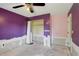 View of the bedroom with a closet and a ceiling fan at 4025 Meadow Run Ln, Wesley Chapel, FL 33543